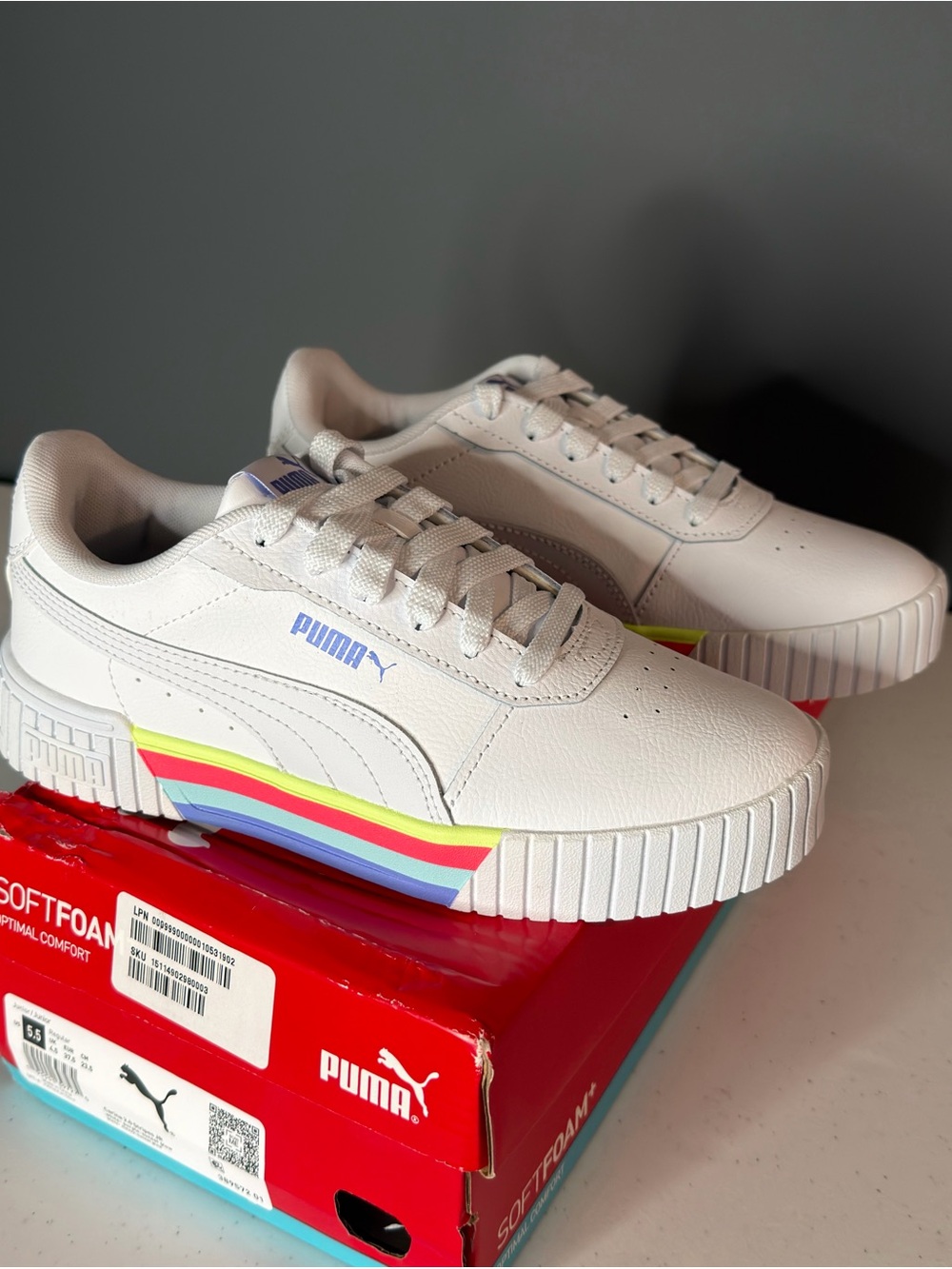 Puma White Kids Sneakers with Rainbow Stripe Accent